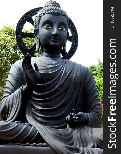 Black Buddha at Wat koh Loy Sri Racha Chonburi Thailand