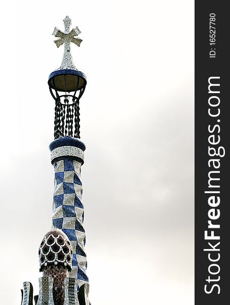 Tower with cross in Parc Guell, Barcelona. Tower with cross in Parc Guell, Barcelona