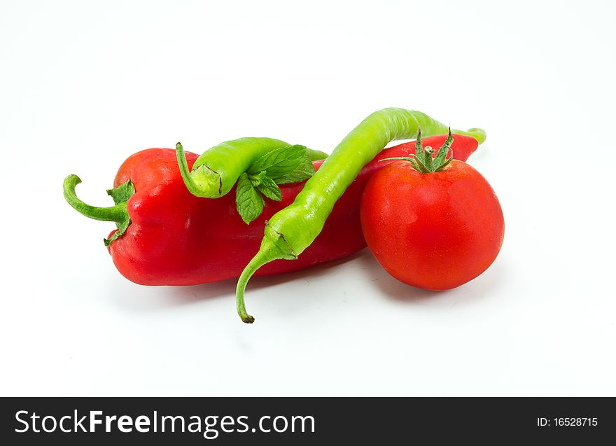 Peppers and Tomatoe on a white background