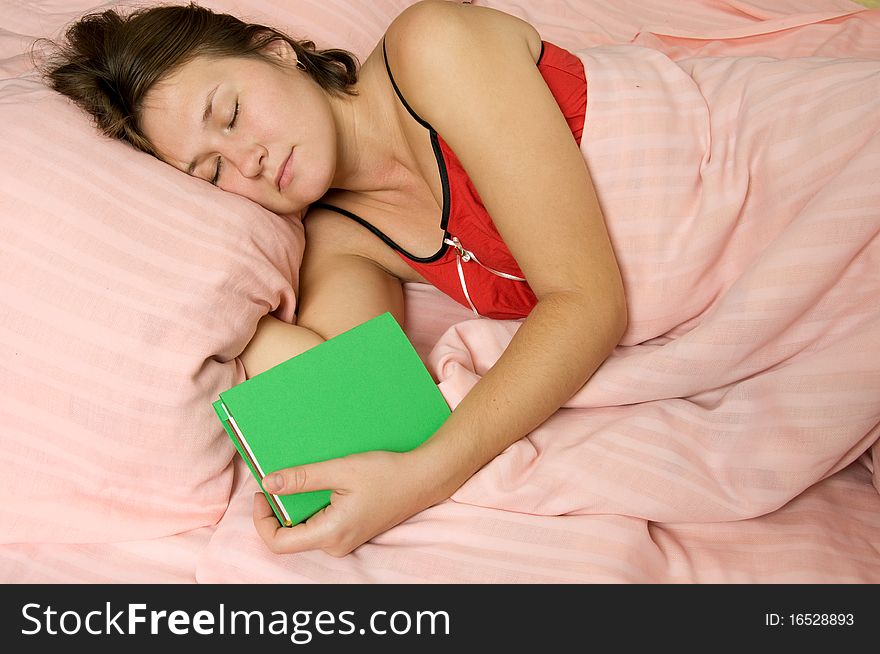 Adorable sleeping woman with book. Adorable sleeping woman with book