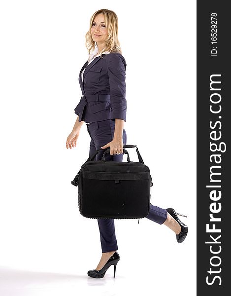 Attractive businesswoman holding briefcase