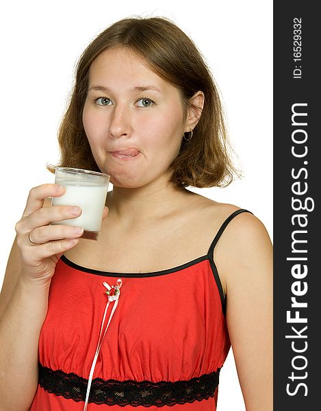 Adorable woman is drinking milk over white. Adorable woman is drinking milk over white