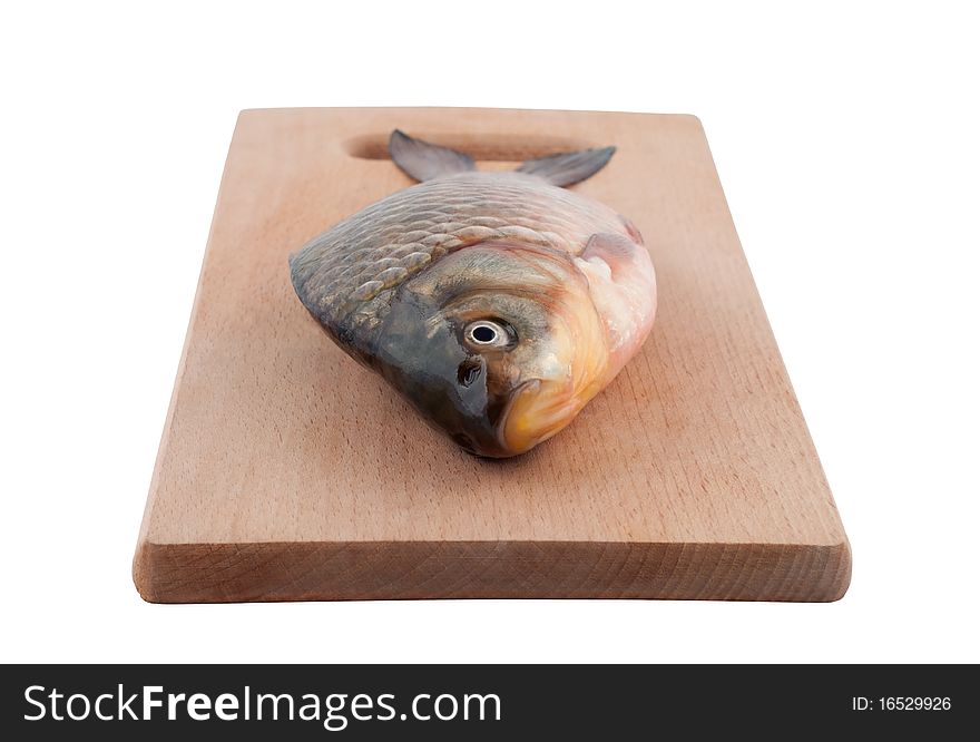 Fish on a board. Isolated on white.
