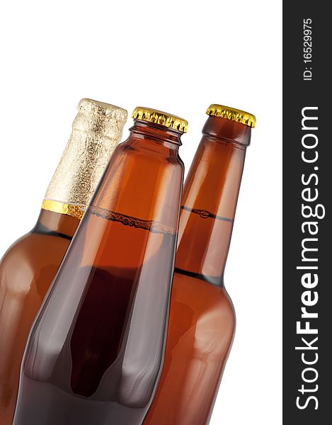 Beer in bottles close up isolated on white. Beer in bottles close up isolated on white.