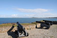 Cannons At Portelet Harbour, Guernsey Stock Photo Cannons At Portelet Harbour, Guernsey Stock Photo