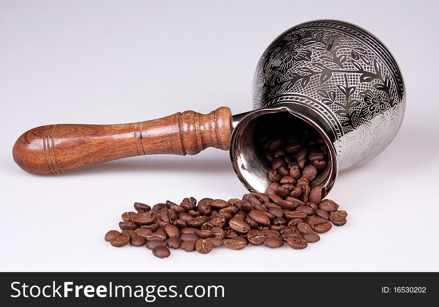 Coffee grains got enough sleep from a ladle