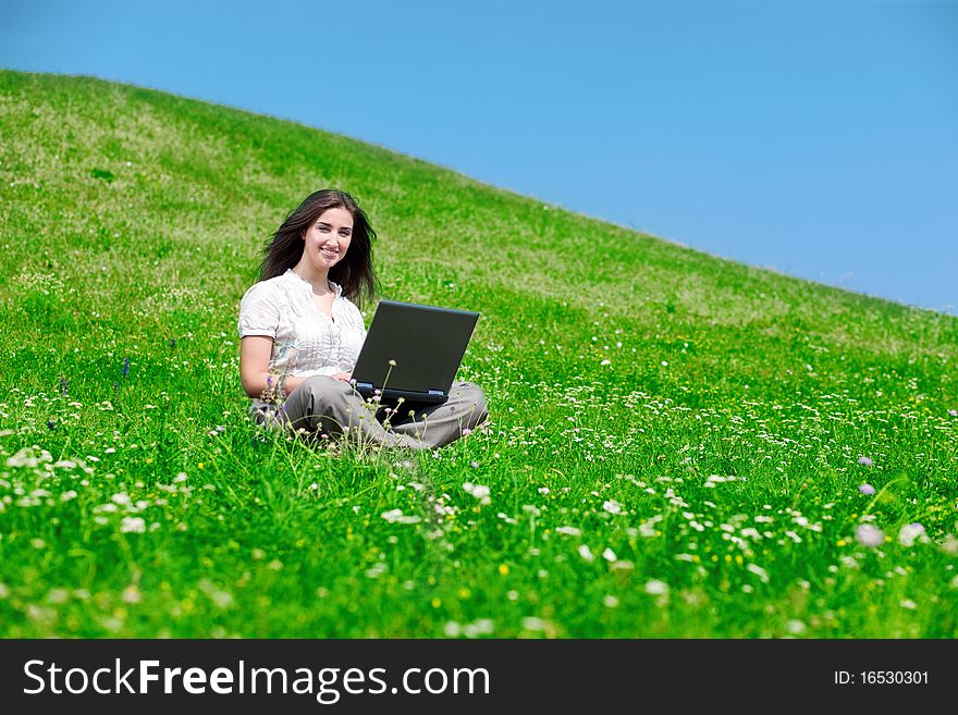 Beautiful  Woman With Notebook  On Hill