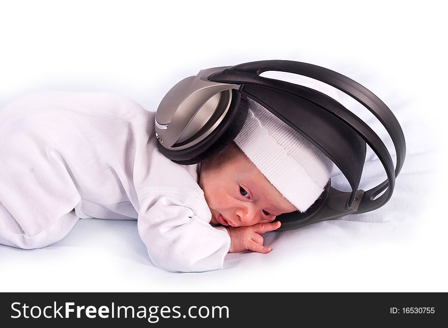 The Newborn Kid Listening To Music