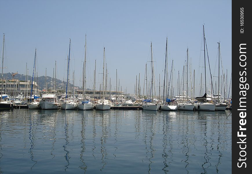 A view of the busy yachting marina in the French city of Cannes. A view of the busy yachting marina in the French city of Cannes
