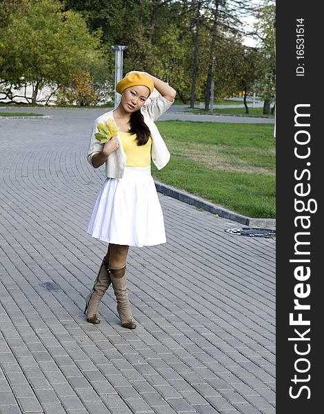 Girl walking in autumn park. Girl walking in autumn park