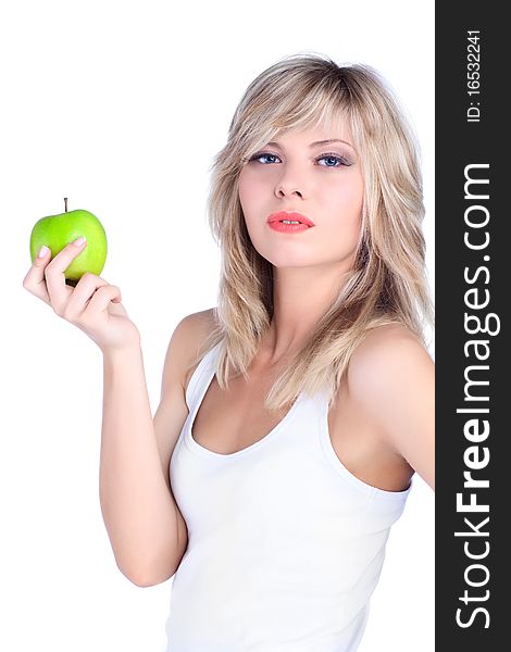 Young girl over white background with apple. Young girl over white background with apple
