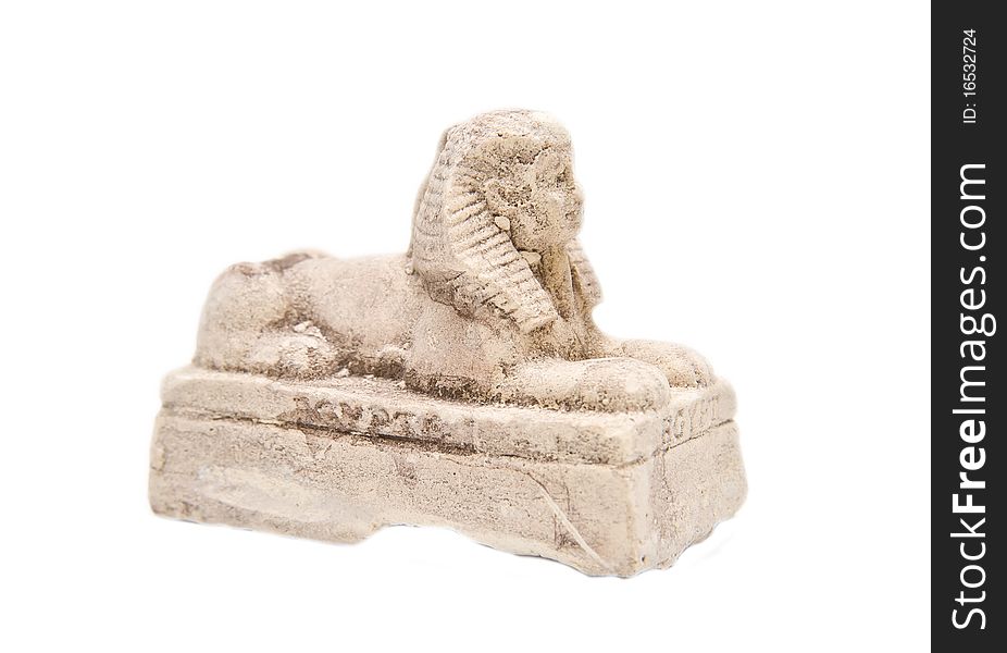 Gypsum statue of a sphinx on a white background