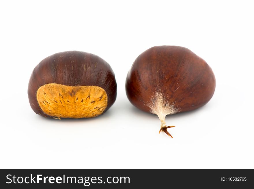 A closeup of chestnuts isolated on white