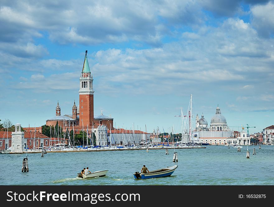 The Church of San Giorgio Maggiore and the Basilica of St. Mary of Health (Salute) in Venice, Italia. View from San Marco canal. The Church of San Giorgio Maggiore and the Basilica of St. Mary of Health (Salute) in Venice, Italia. View from San Marco canal.