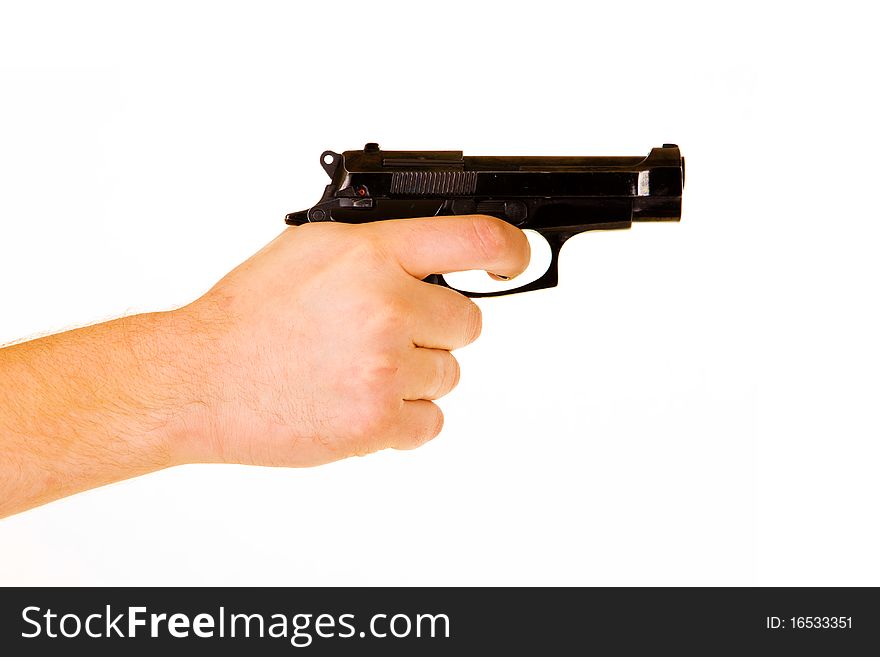 Men's hand with a gun isolated on white background. Men's hand with a gun isolated on white background