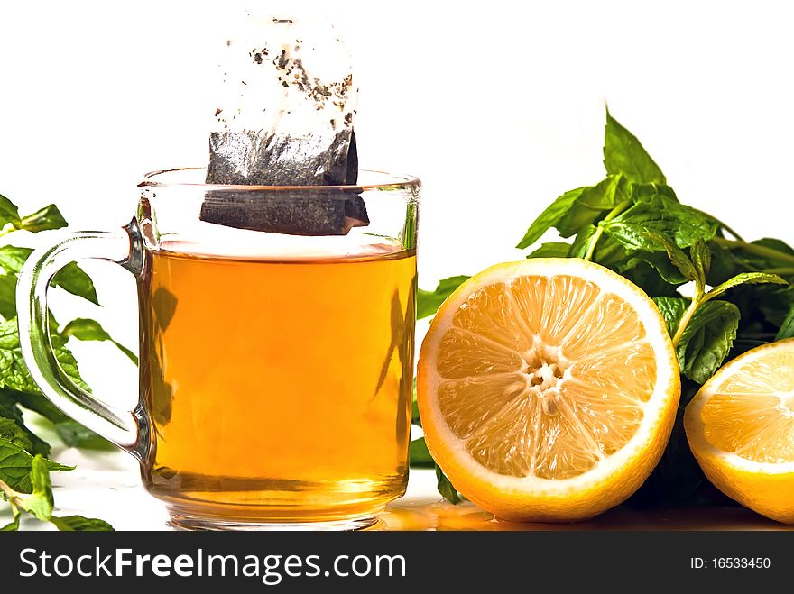 Tea glass with tea bags and lemon