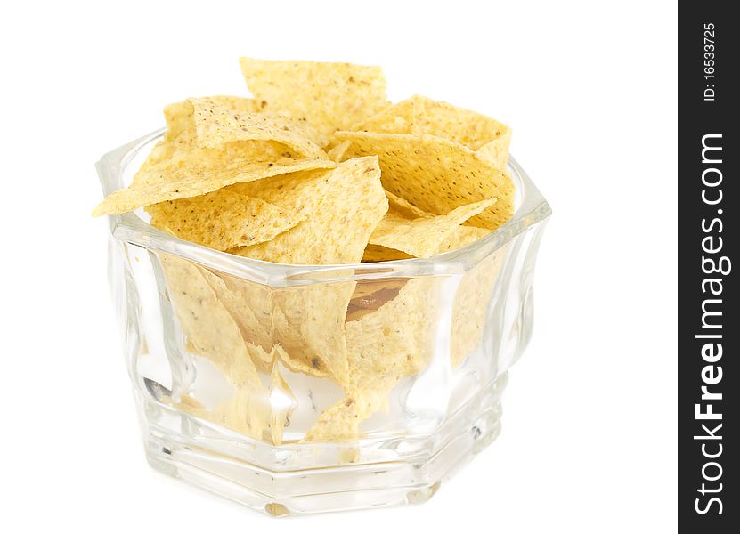 Tortilla chips isolated on white background in vase closeup.