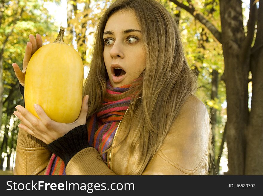 Girl Holding A Pumpkin