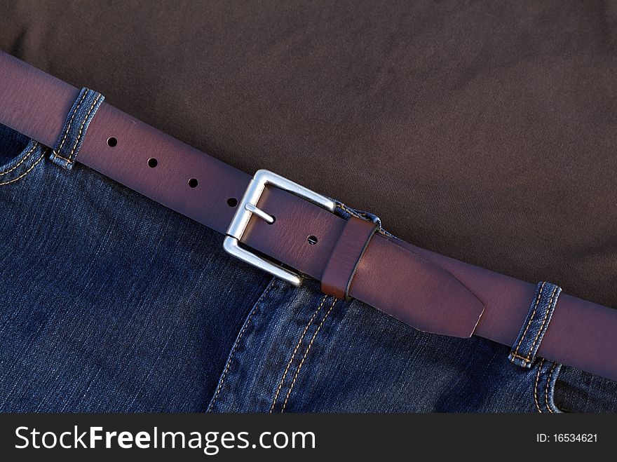Casual fashion trend Brown shirt and blue jeans with belt. Casual fashion trend Brown shirt and blue jeans with belt