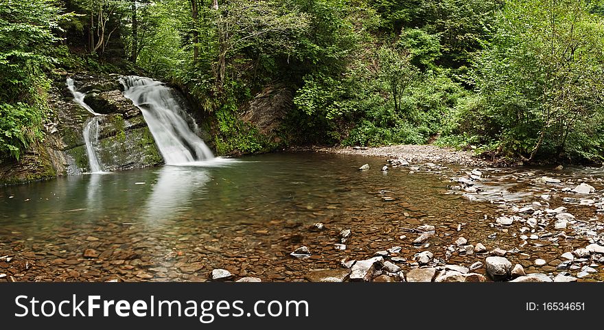 Beauty waterfall in green rainforest