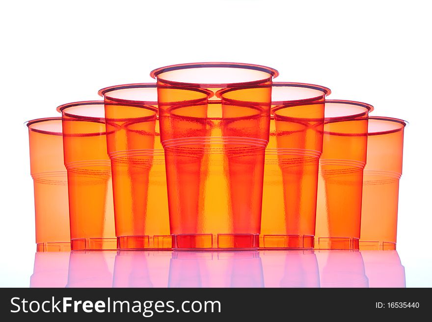 Group of plastic glasses on a white background