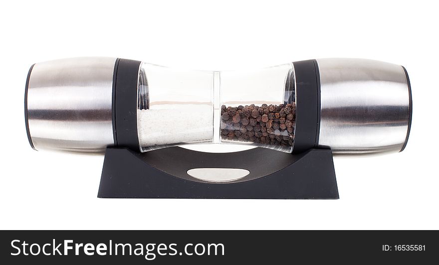 Series. A glass grinder of pepper isolated on a white background