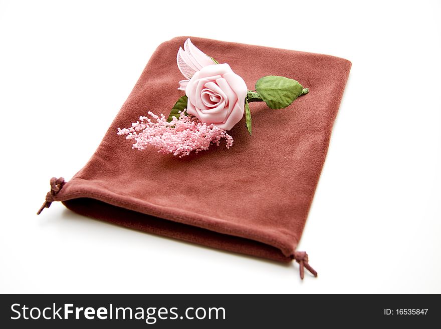 Pink rose onto material bags