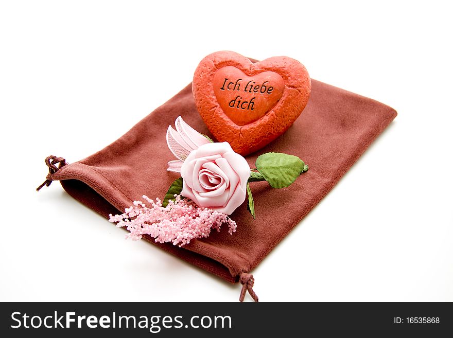 Pink rose and heart onto material bags