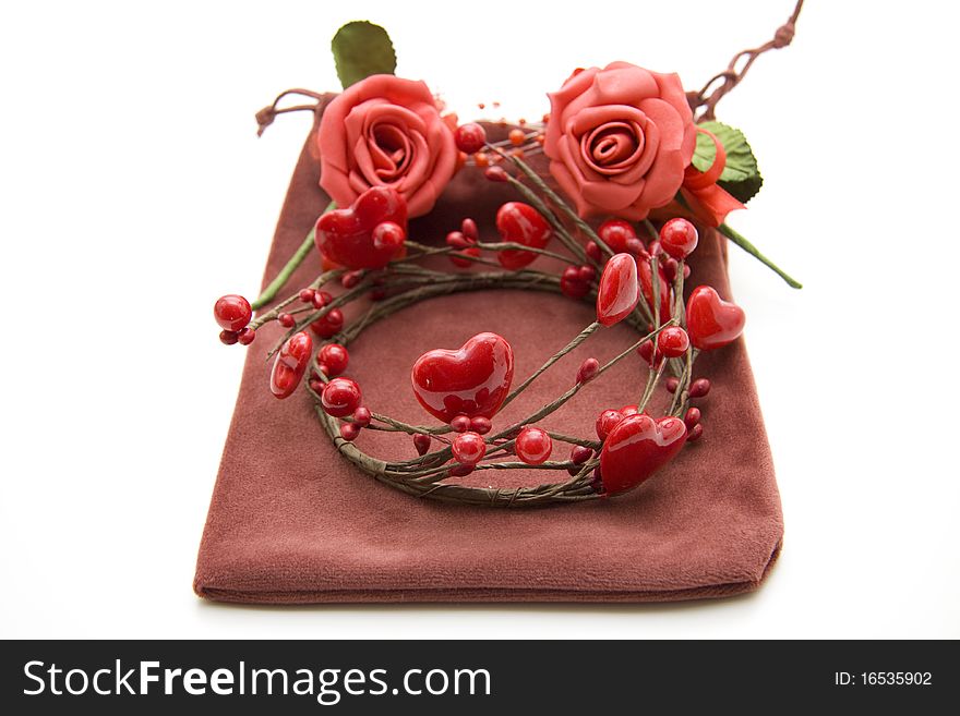 Wreath from heart onto material bags