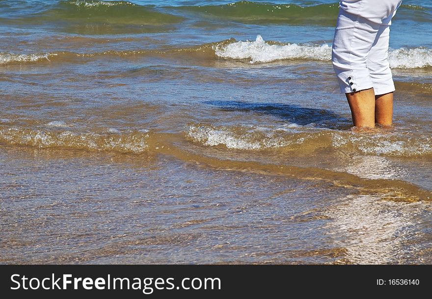 Woman legs in the sea. Photo taken in Lake Michigan, Chicago