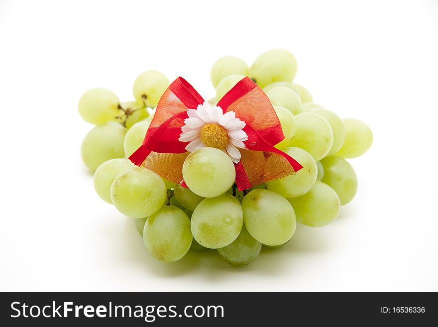 Bunches of grapes with red bow