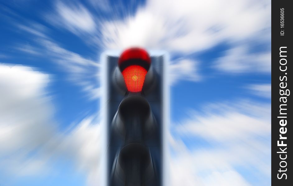 Red traffic light against cloudy blue sky with zoom effect. Red traffic light against cloudy blue sky with zoom effect