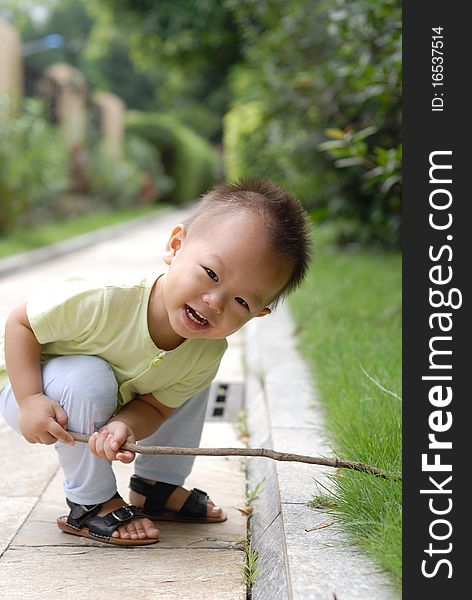 It is a cute chinese baby in the outdoor. It is a cute chinese baby in the outdoor.