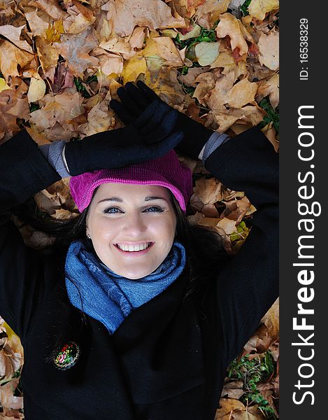 Pretty Autumn Girl Relaxing Outdoors In The Forest