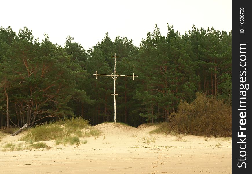 Cross on the coast of Baltic sea