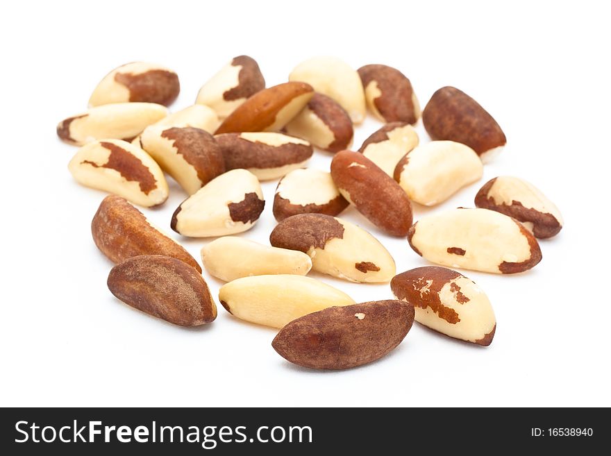 Selection of Brazil nuts on a white isolated background
