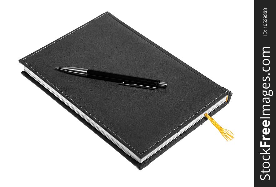 Notepad and pen isolated over white background