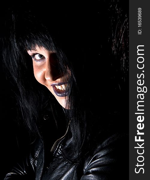 Portrait of smiling gothic woman with black hair. Portrait of smiling gothic woman with black hair