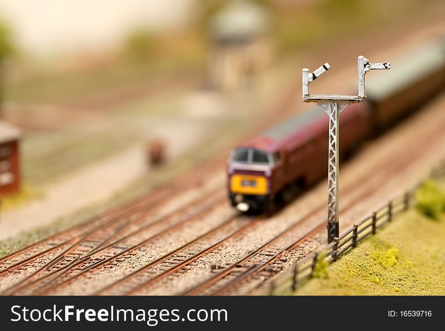 Miniature locomotive passing signals with shallow d.o.f. Miniature locomotive passing signals with shallow d.o.f