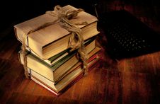 Sheaf Of Old Books And The Laptop Royalty Free Stock Images