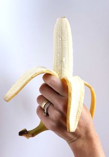 Peeled Banana Held In The Hand Stock Photography Peeled Banana Held In The Hand Stock Photography