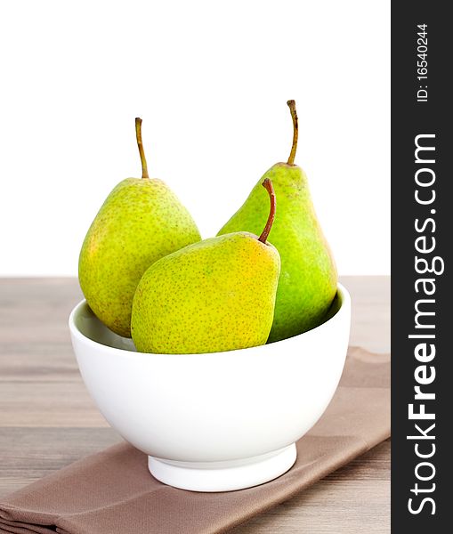 Three charneux pears in a bowl. Three charneux pears in a bowl