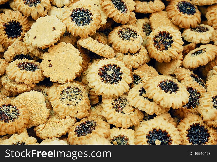 Close up of cookies filled with jam on market stand. Close up of cookies filled with jam on market stand