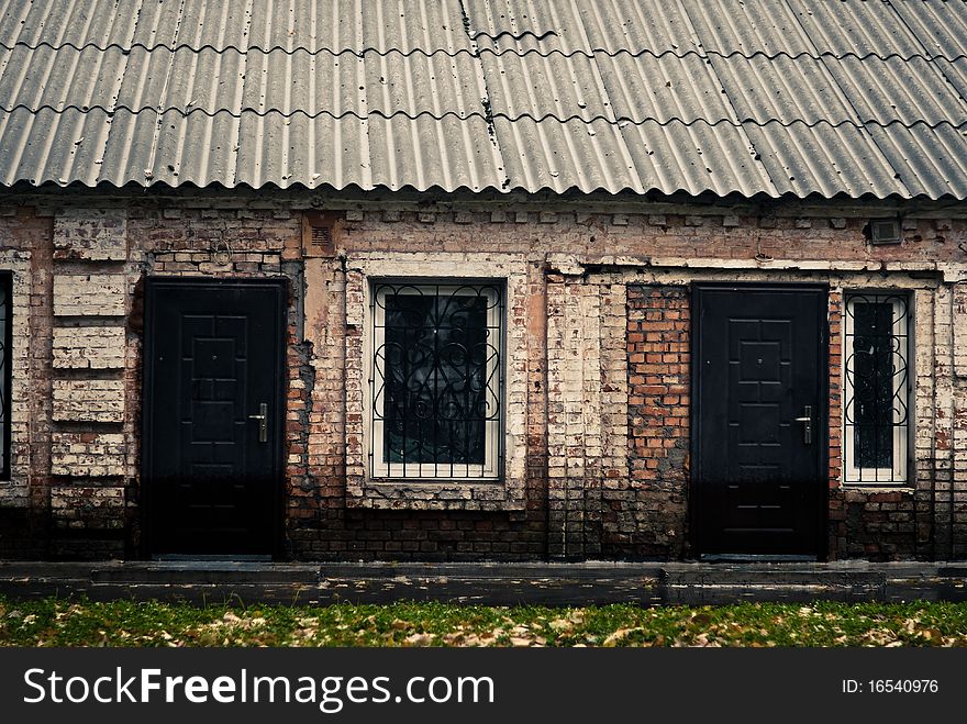 Old building at rainy fall season weather