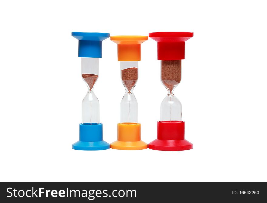 Three motley hourglasses isolated on white background with clipping path