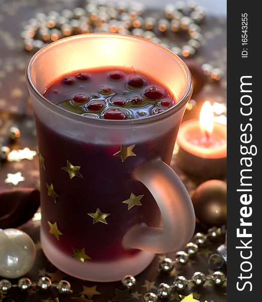 Hot drink with cranberries and cinnamon