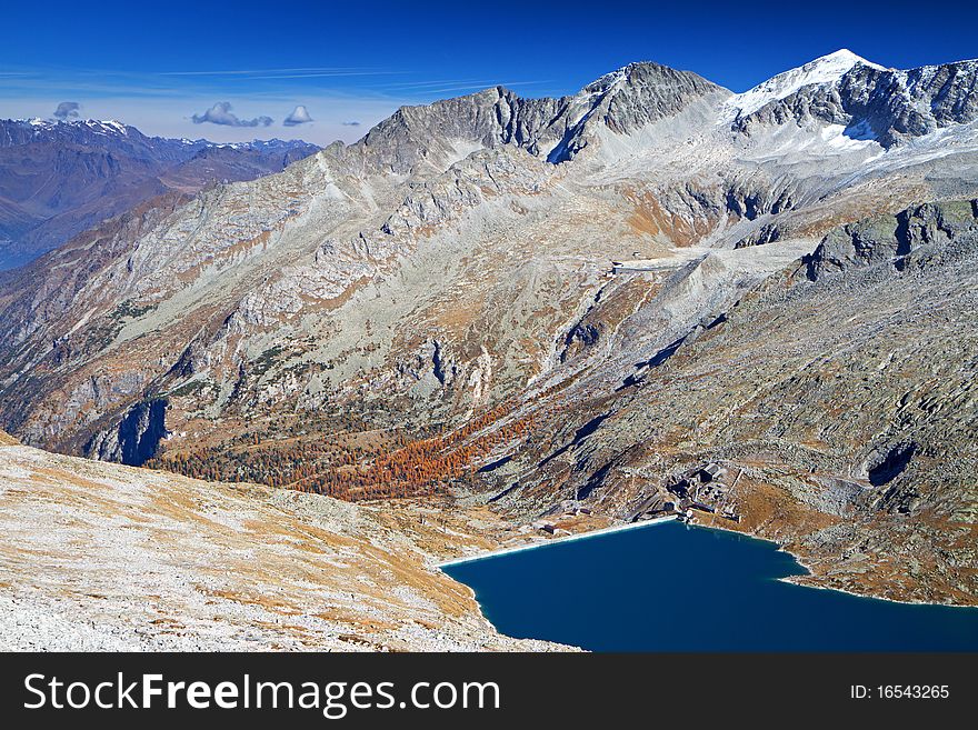 Pantano man-made lake basin at 2378 meters on the sea-level. Along the front mountain there’s Venerocolo dam at 2540 meters on the sea-level