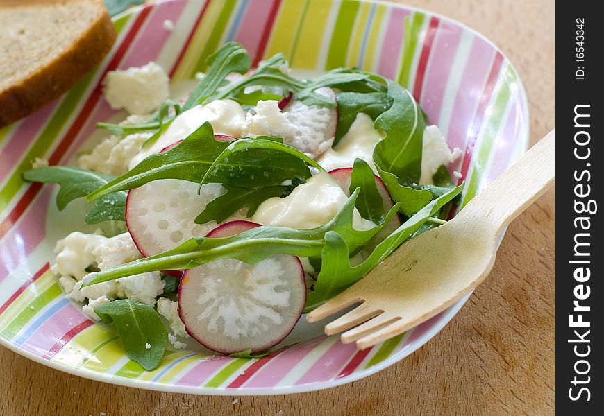 Fresh vegetable salad with cottage cheese and arugula. Fresh vegetable salad with cottage cheese and arugula