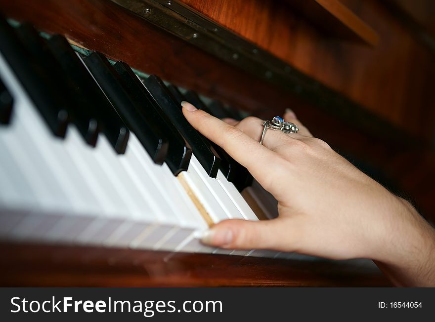 Hands playing music on the piano, hands and piano player, keyboard