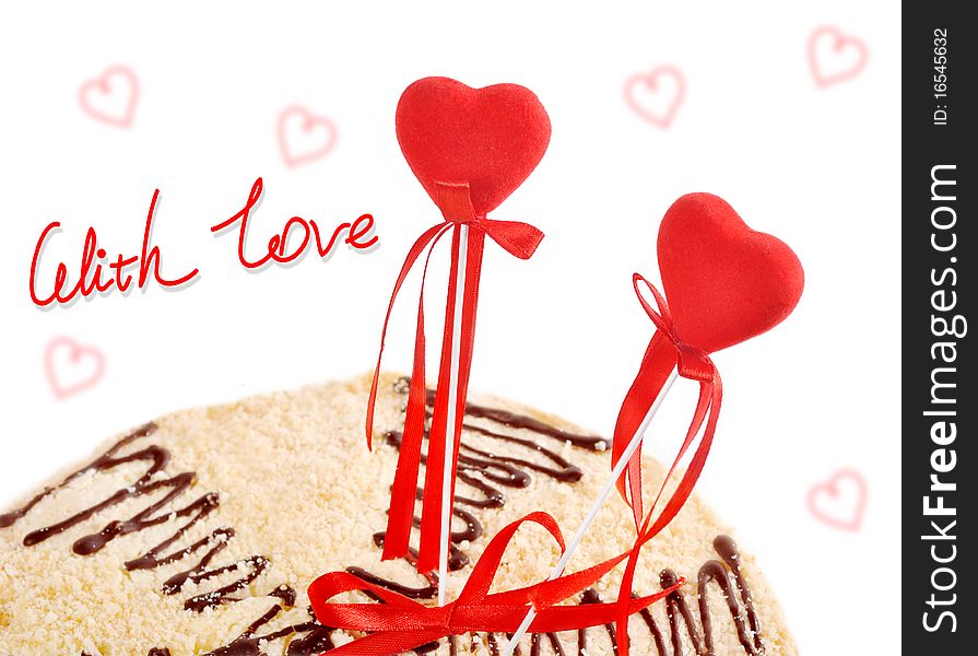 Two red hearts in a target of cake on a white background